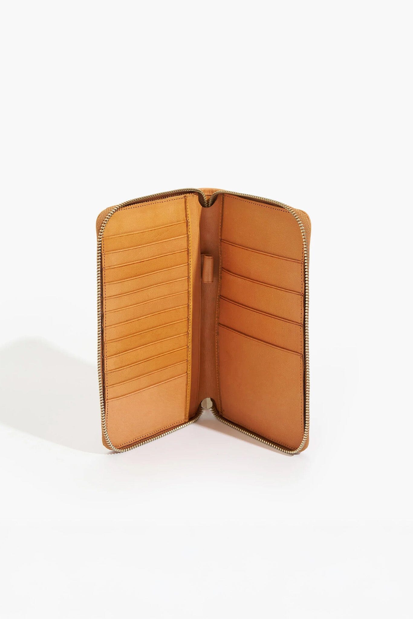 Tan leather wallet interior on a white background