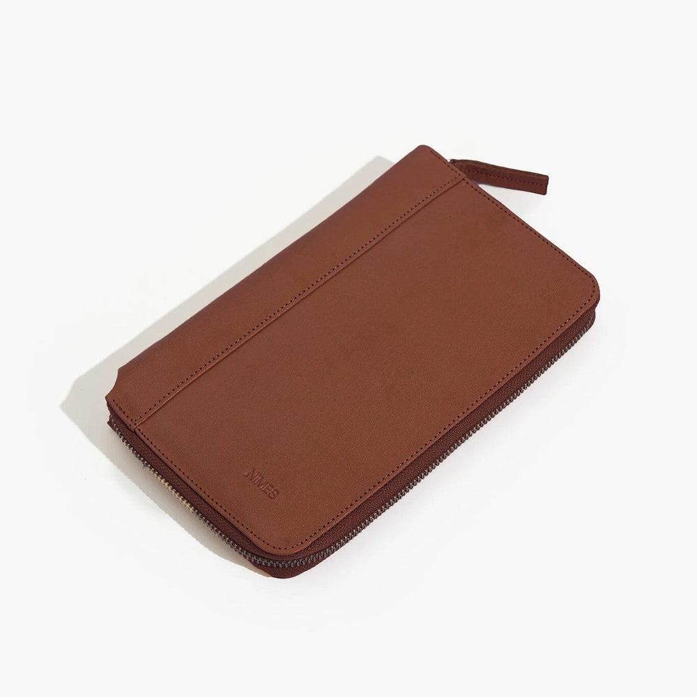 Brown leather wallet on a white background