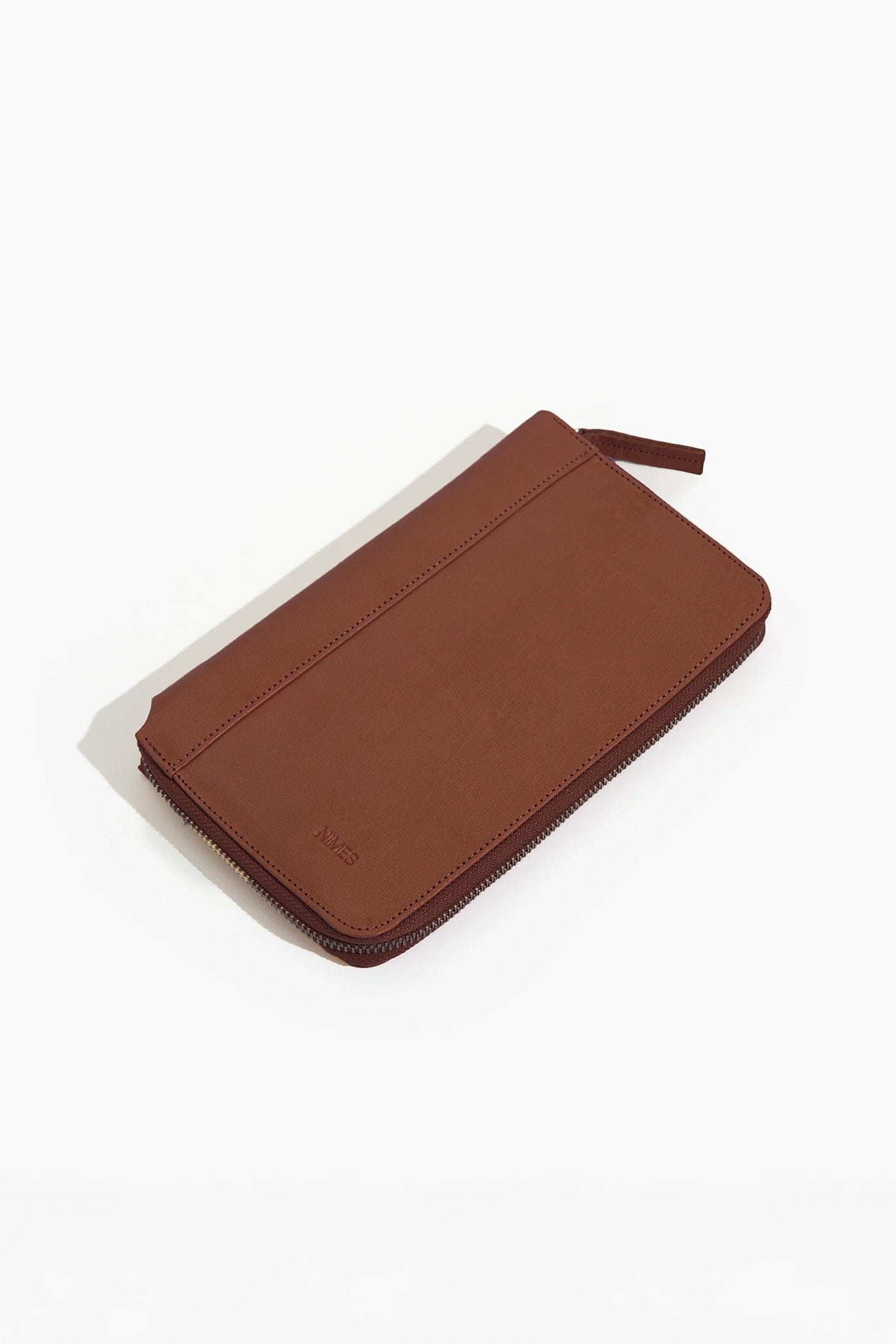 Brown leather wallet on a white background