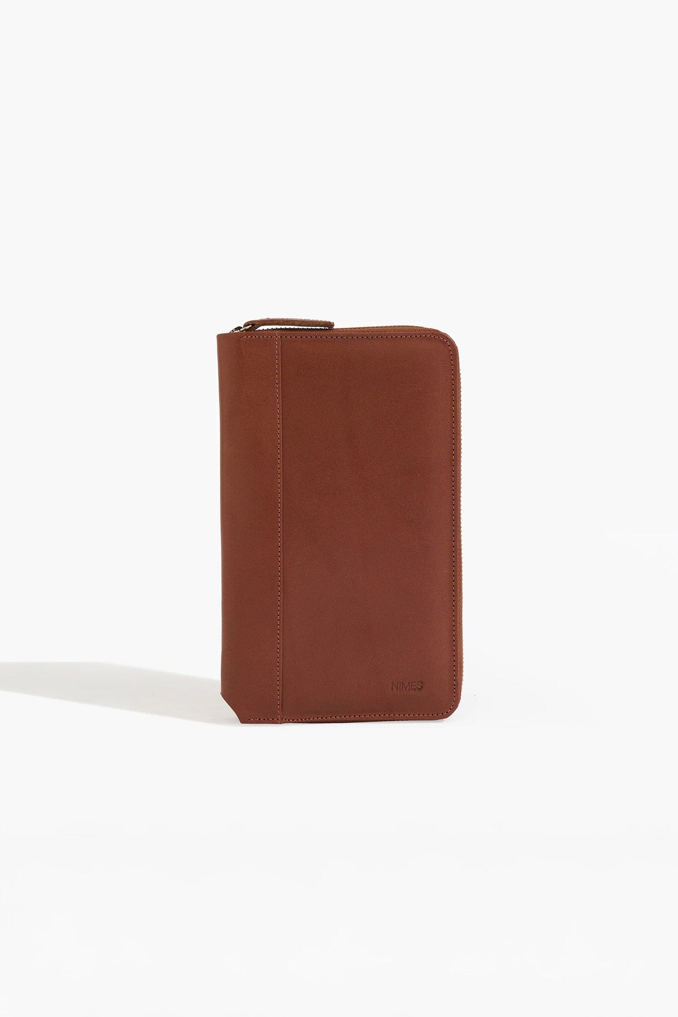 Brown leather wallet on a white background