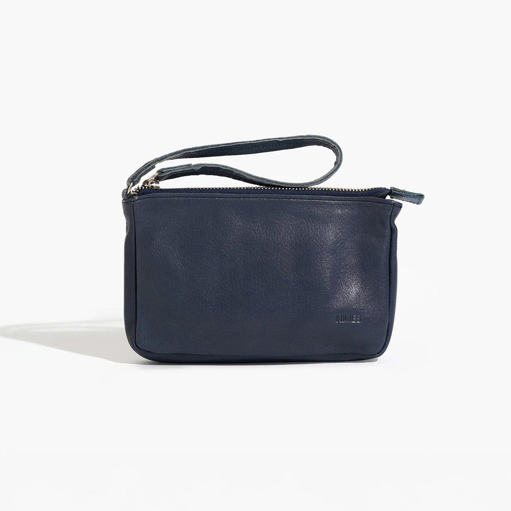 Navy blue leather zipper wristlet pouch on a white background