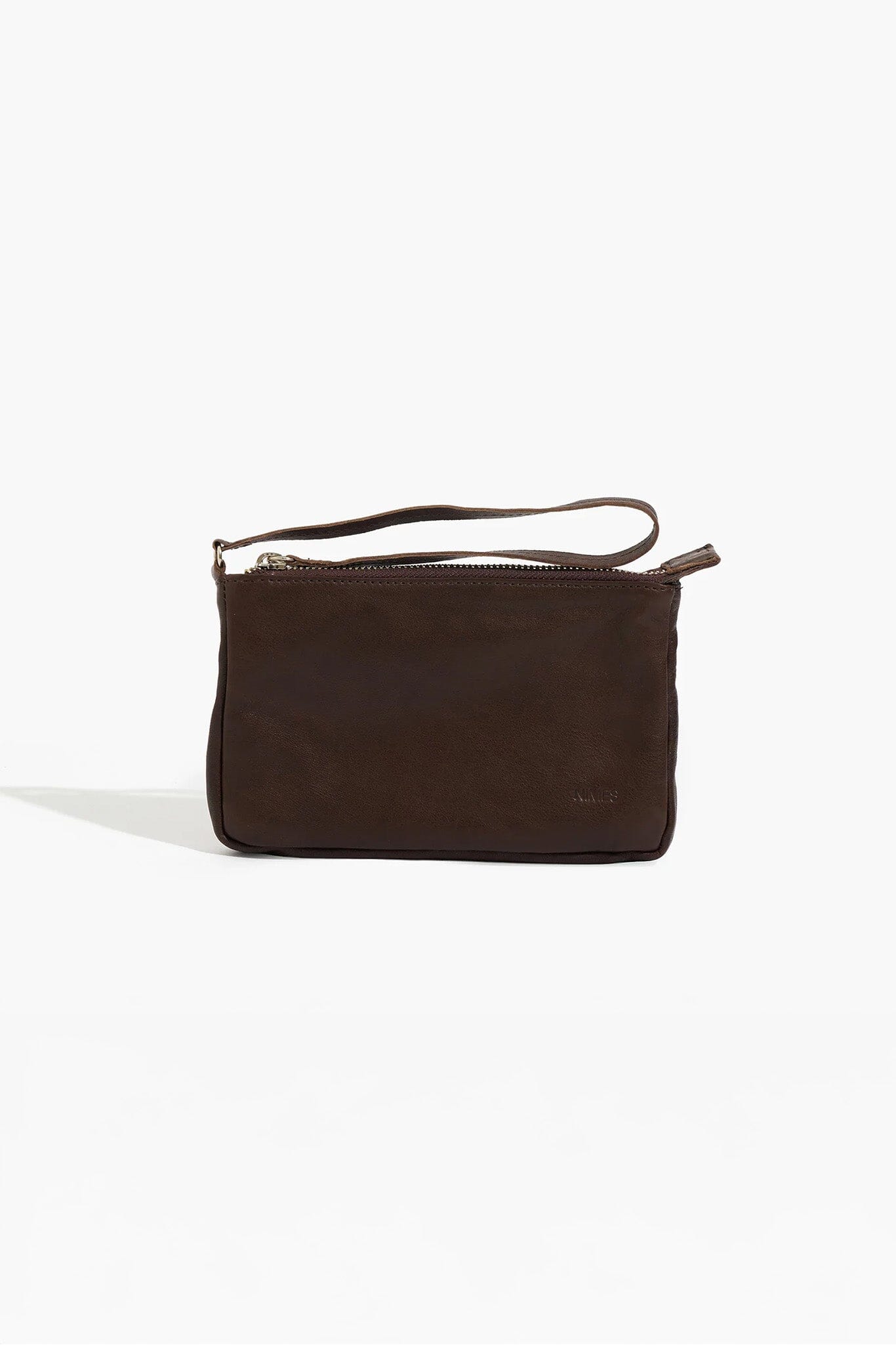 Brown leather clutch bag on a white background