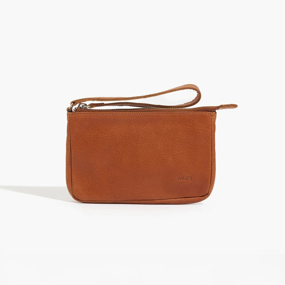 Brown leather clutch bag on a white background