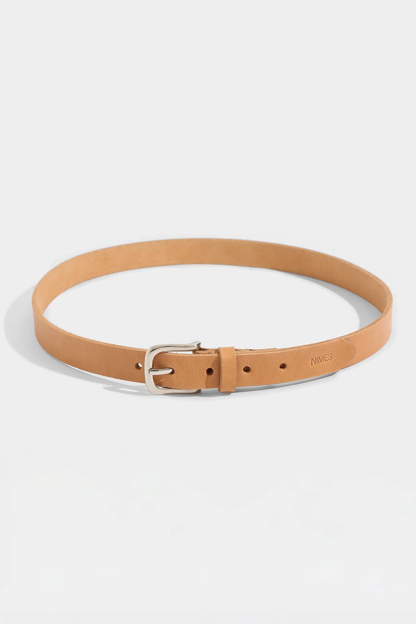 Tan leather belt with a silver buckle on a white background