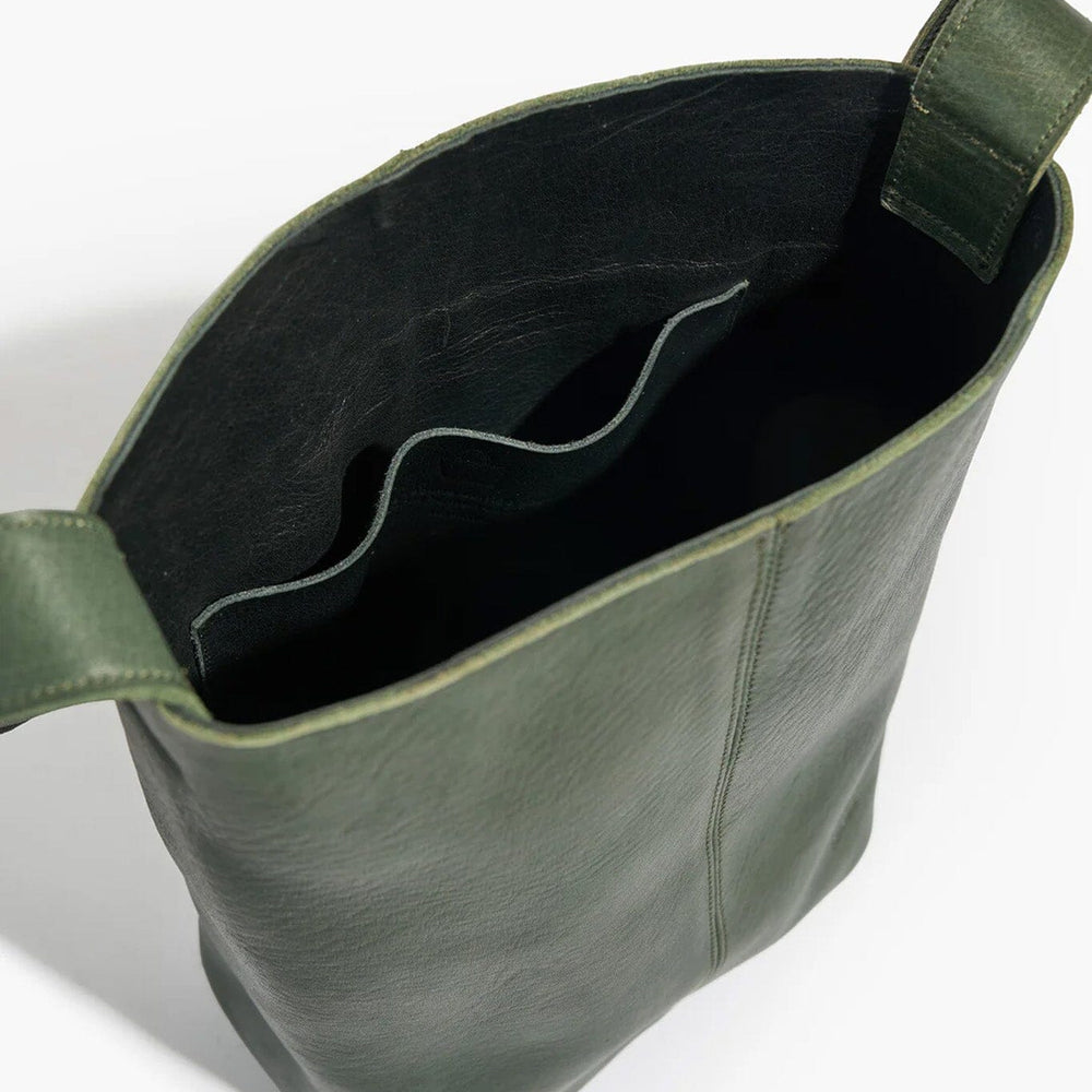 
                  
                    Green leather bag with an interior pocket on a white background
                  
                