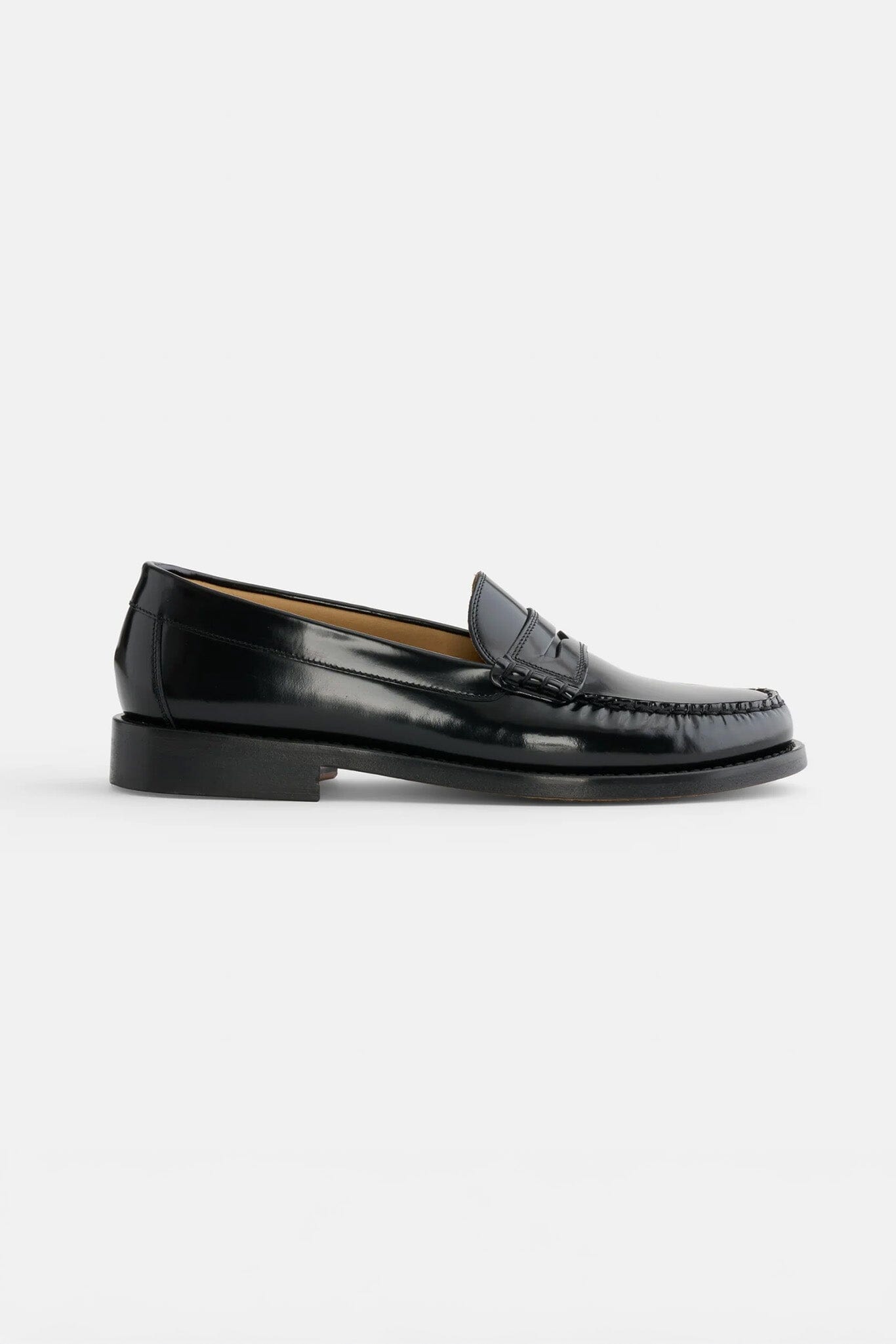 Black loafer shoe on a white background