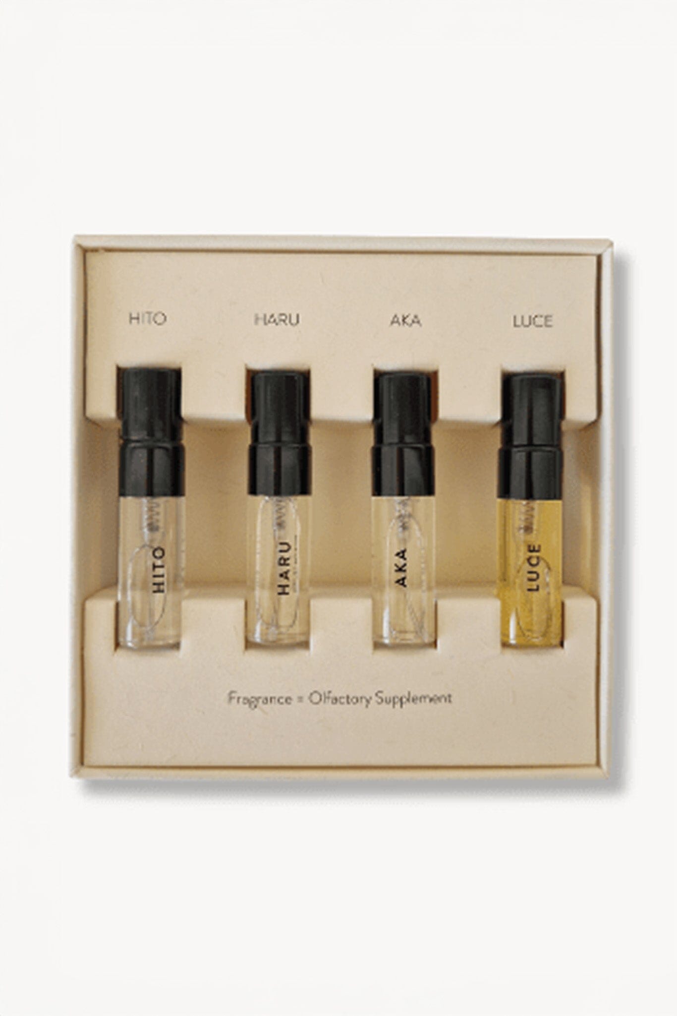 Set of four fragrance samples in a box labeled Hito, Haru, Aka, and Luce on a white background.