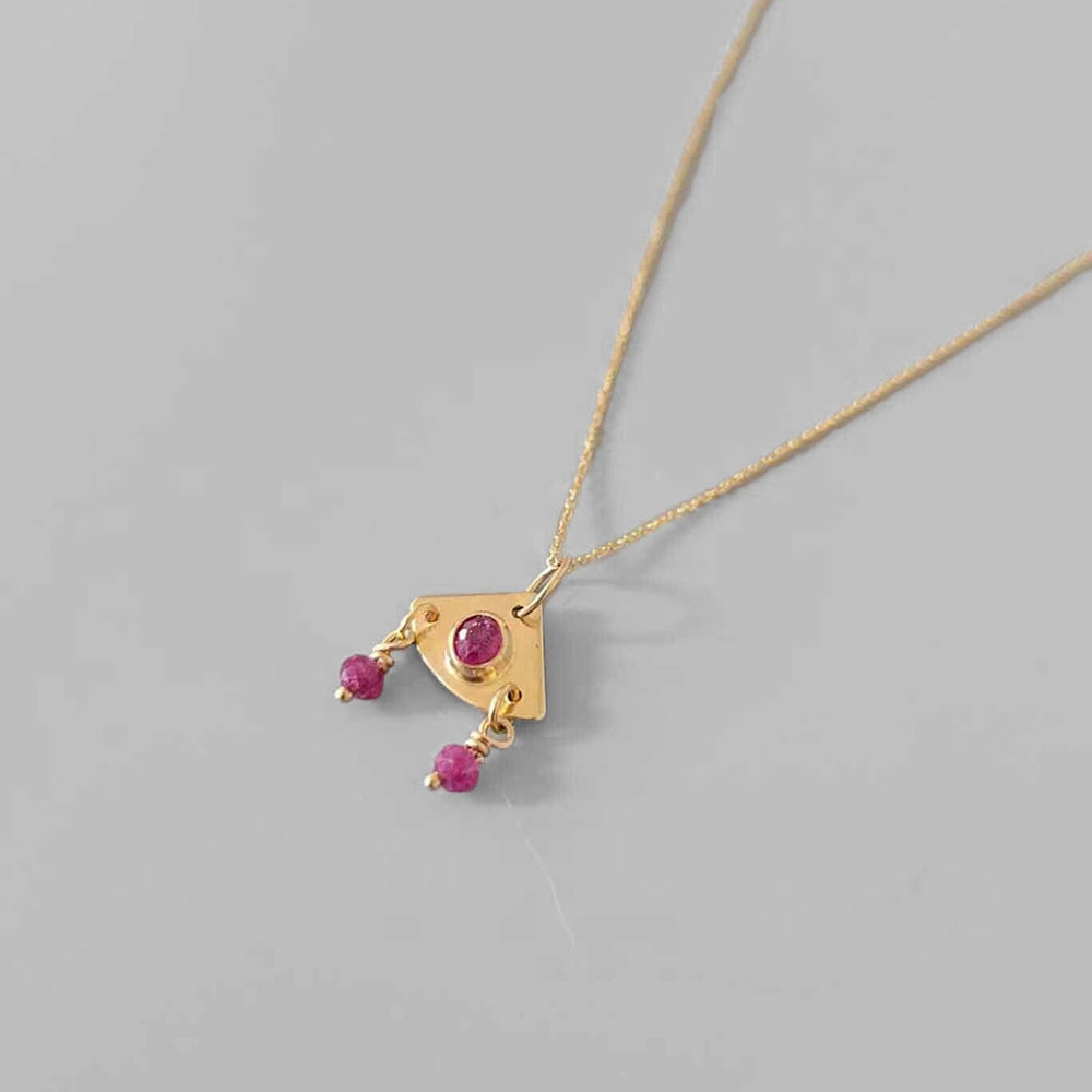 14k yellow gold and ruby dainty ra necklace by Cobamae. Handmade in Brooklyn New York. Available to purchase at M.Patmos.