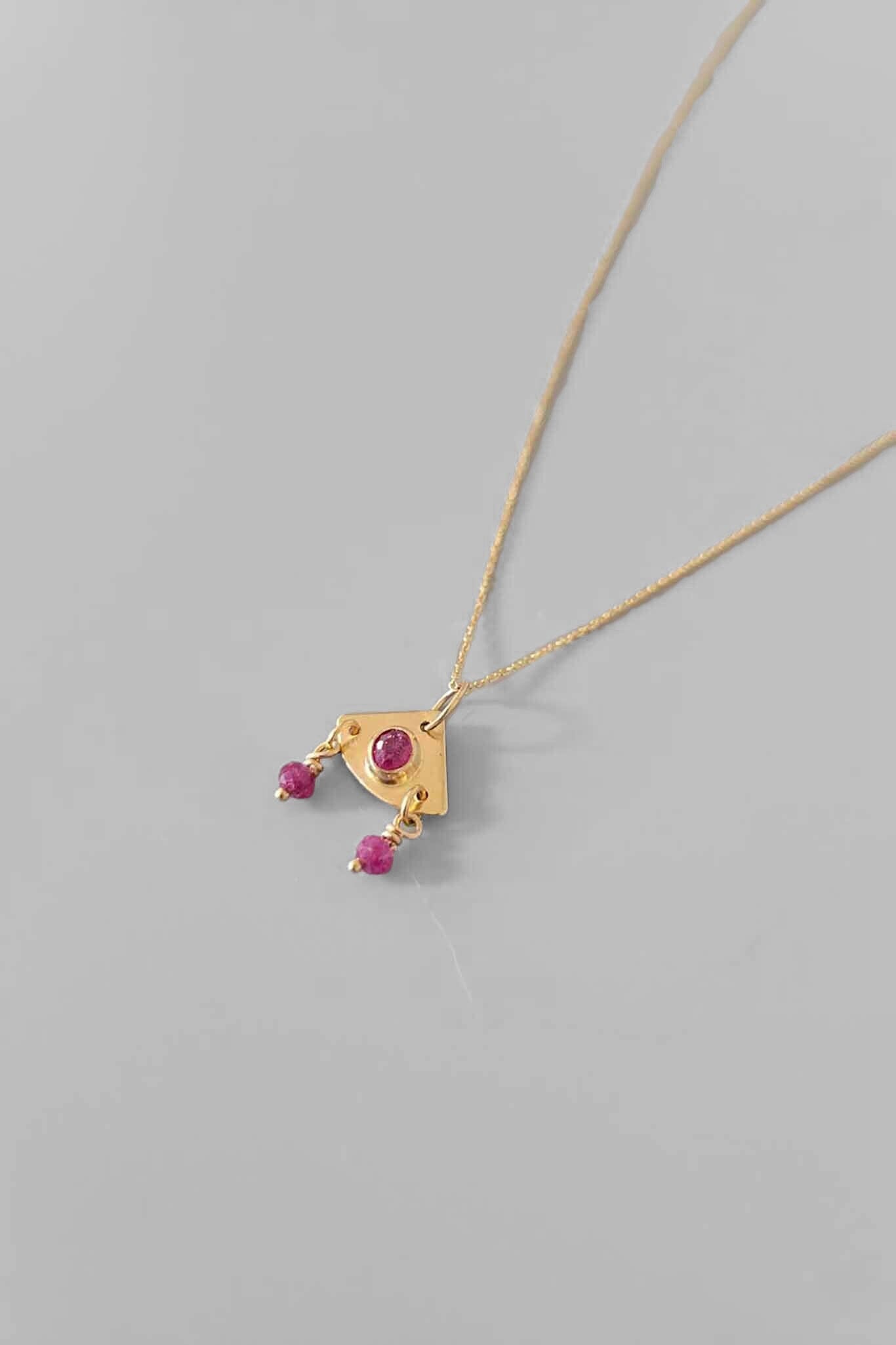 14k yellow gold and ruby dainty ra necklace by Cobamae. Handmade in Brooklyn New York. Available to purchase at M.Patmos.