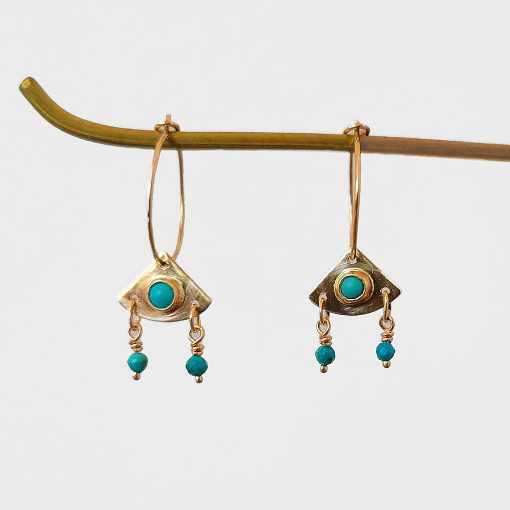 Beautiful bohemian style everyday earrings from Cobamae New York. 14k hoops with triangle charms and turquoise beads.