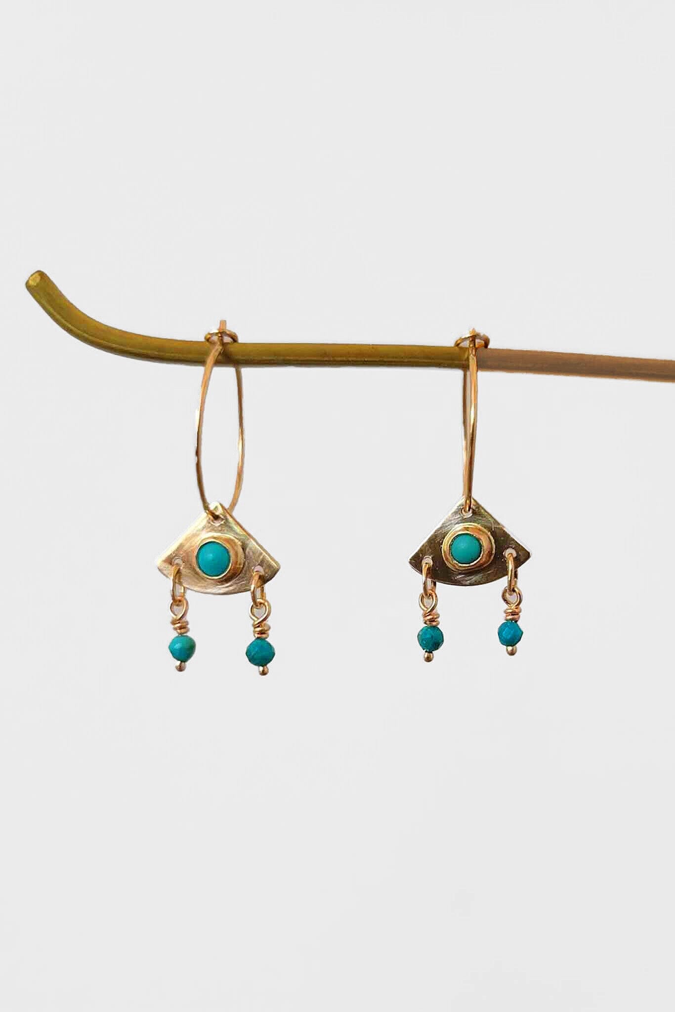 Beautiful bohemian style everyday earrings from Cobamae New York. 14k hoops with triangle charms and turquoise beads.