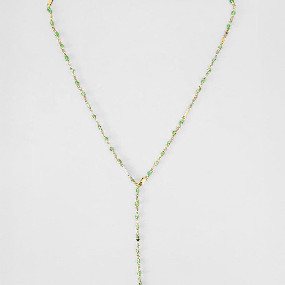 Beautiful green baguette necklace with 14k yellow gold baguette charms.