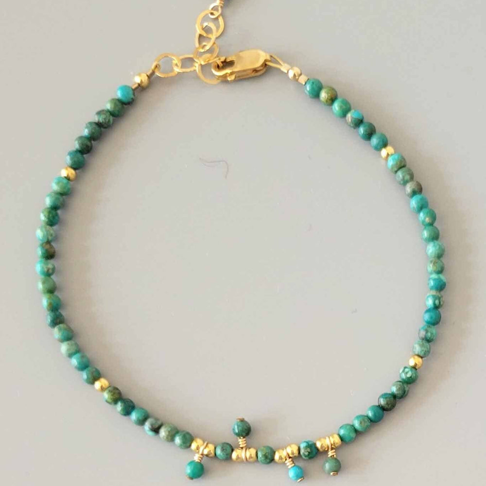 Gold and turquoise beaded bracelet