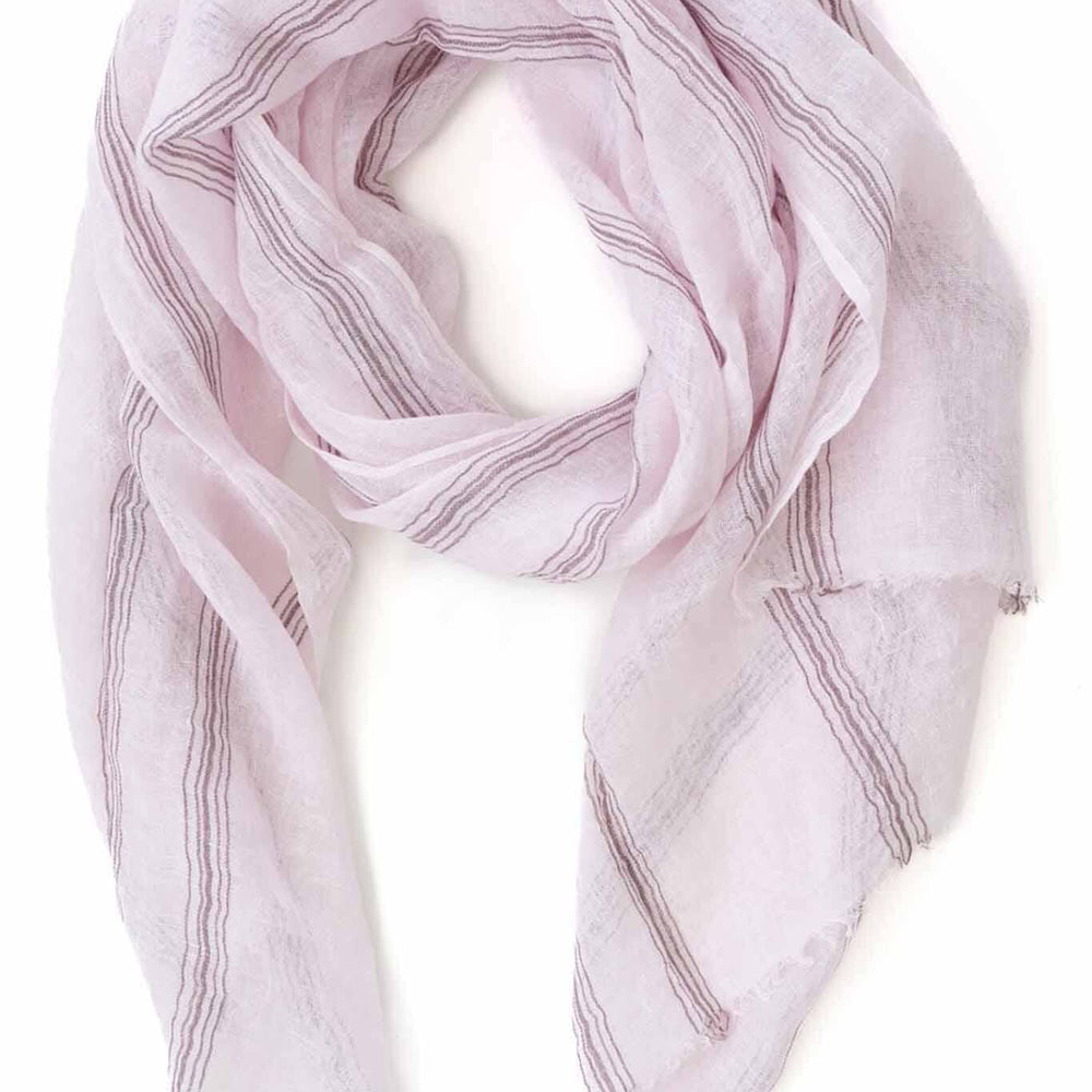 A handwoven scarf in lilac color with striped patterns, made of linen, displayed on a white background.
