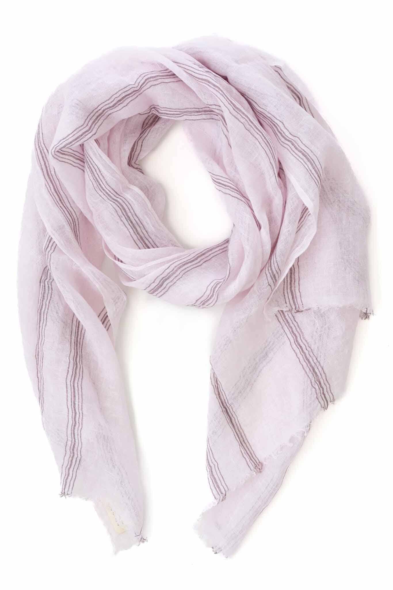 A handwoven scarf in lilac color with striped patterns, made of linen, displayed on a white background.