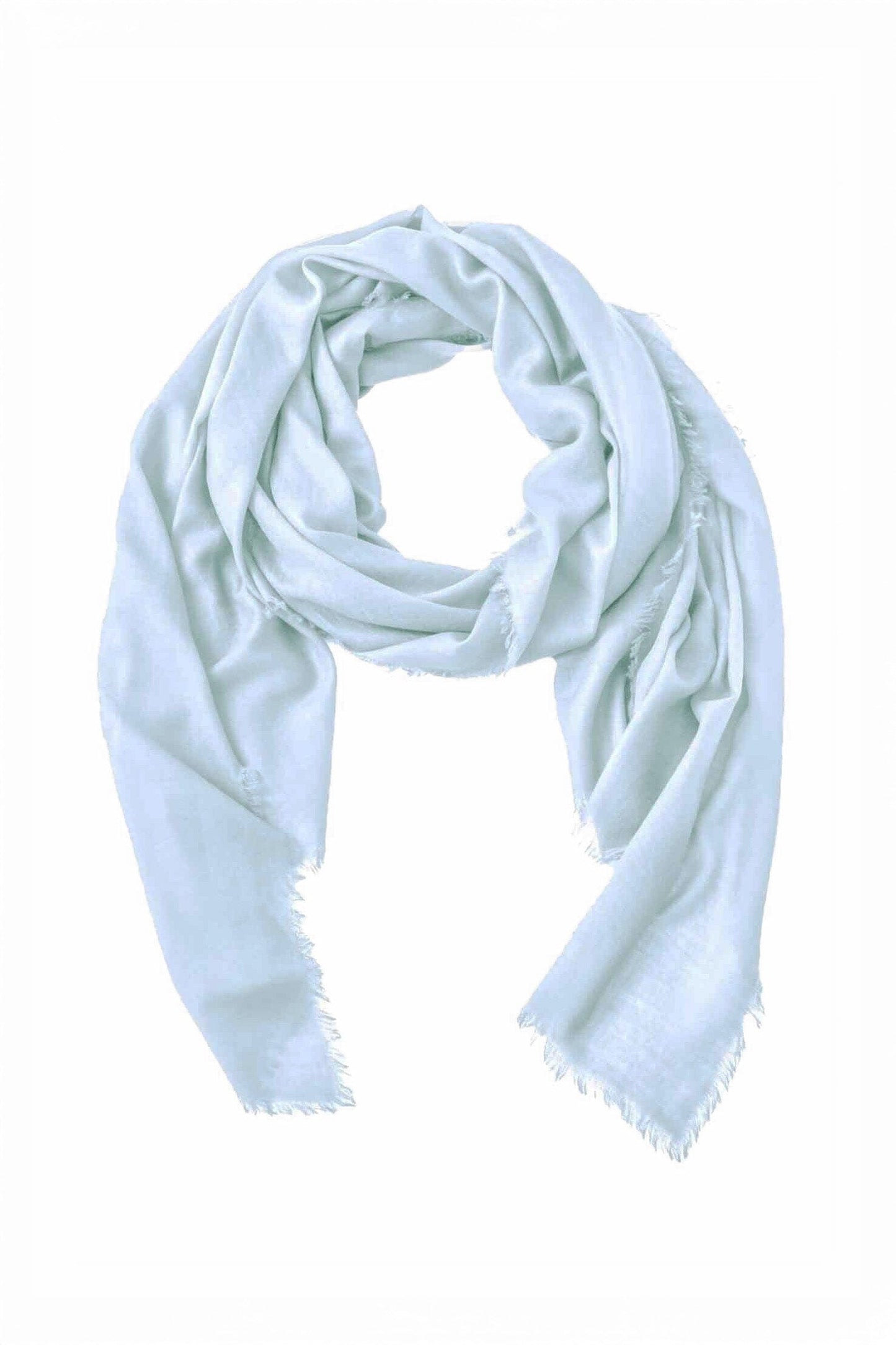 Light blue cashmere and merino wool scarf on a white background