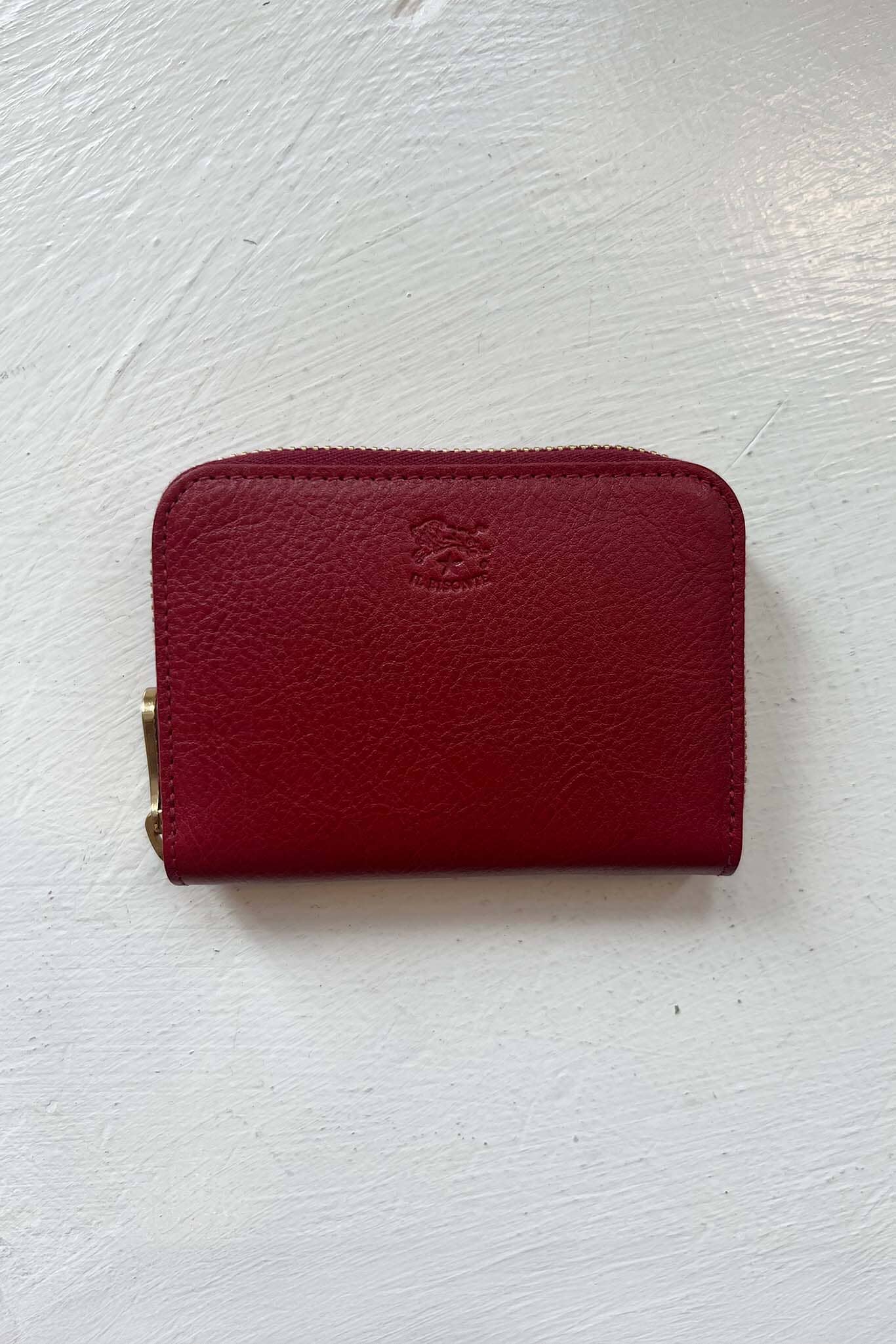 Red wallet on white background.