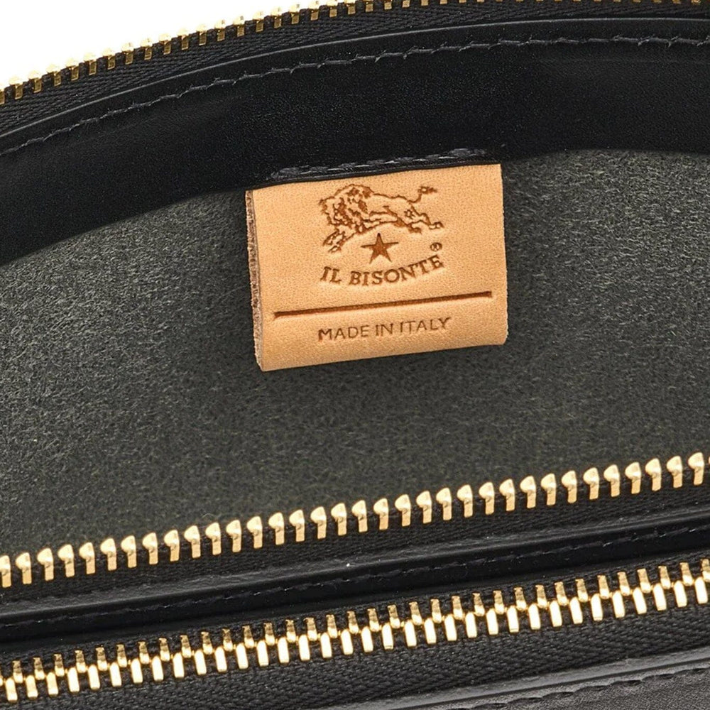 
                  
                    Black interior leather bag with gold zipper and 'Il Bisonte' brand label on a white background
                  
                