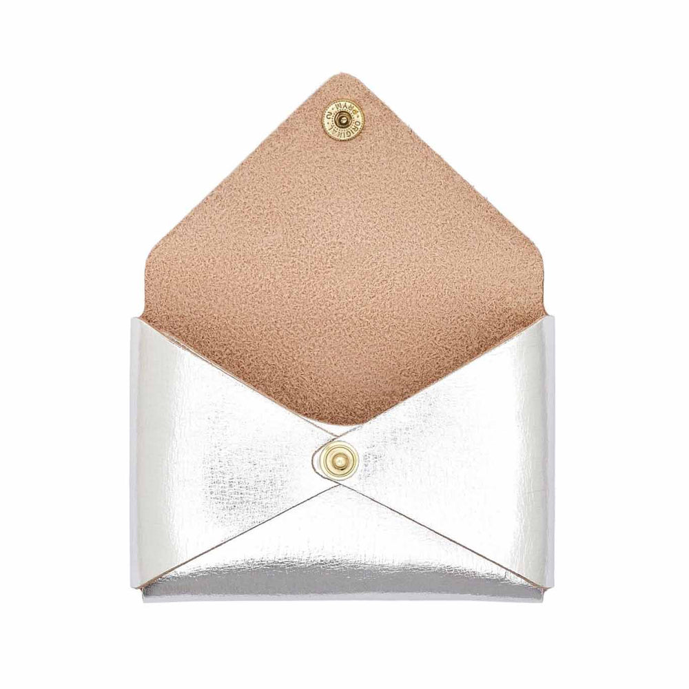 Small leather silver card case with suede interior with brass snap closure