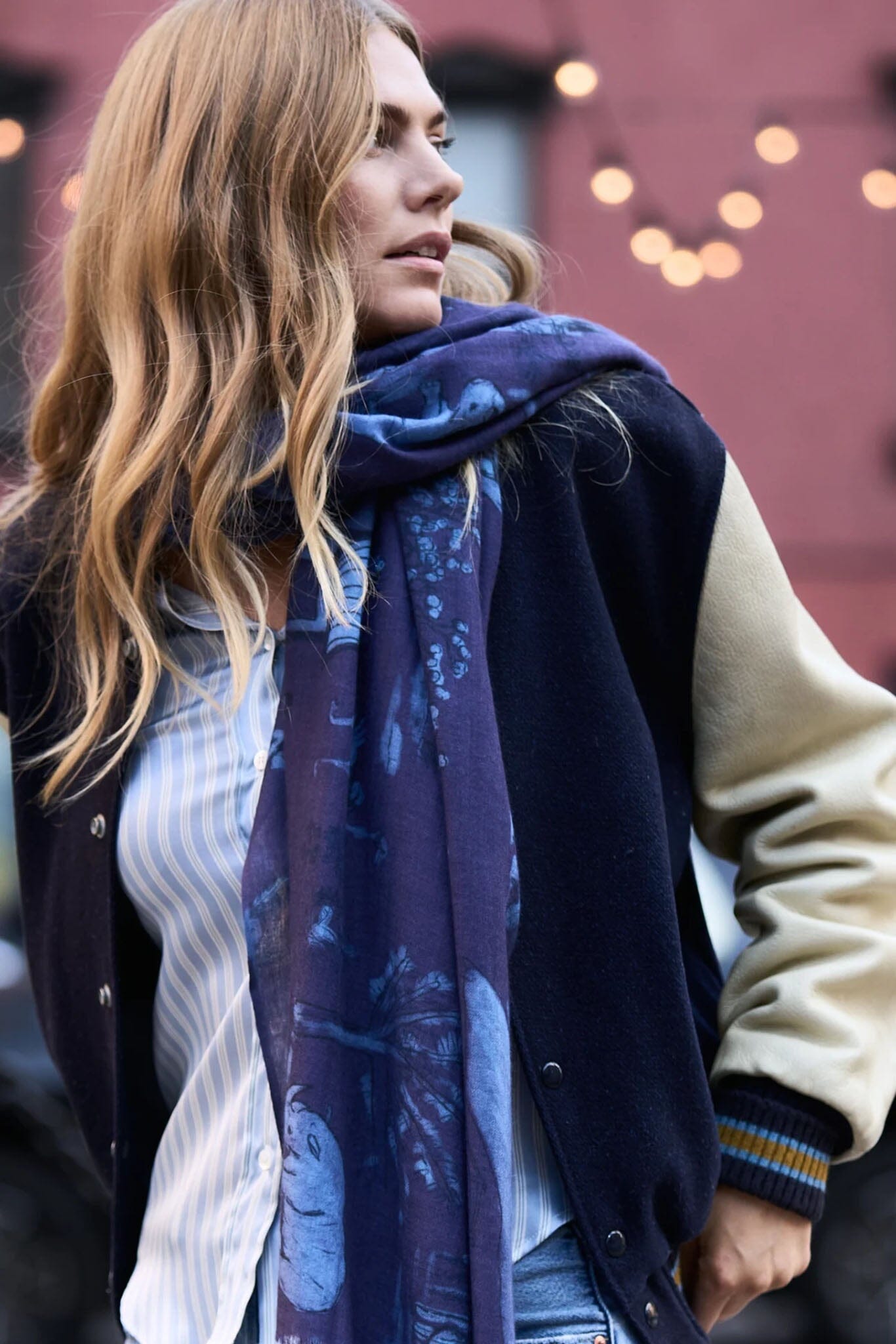 A model wears the Lalela blue toile silk, wool and cashmere scarf