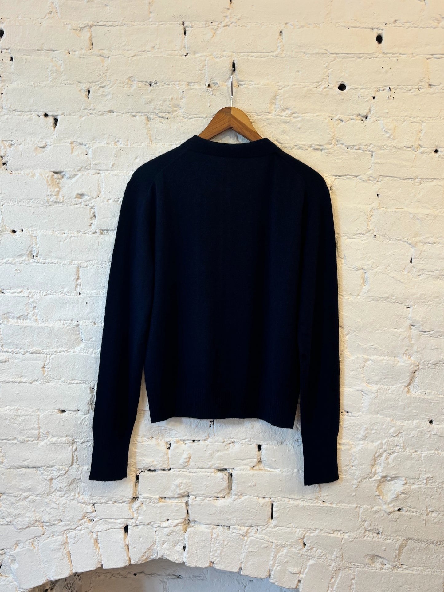 Back view of M.Patmos navy 100% cashmere cardigan with long sleeves and classic fit.
