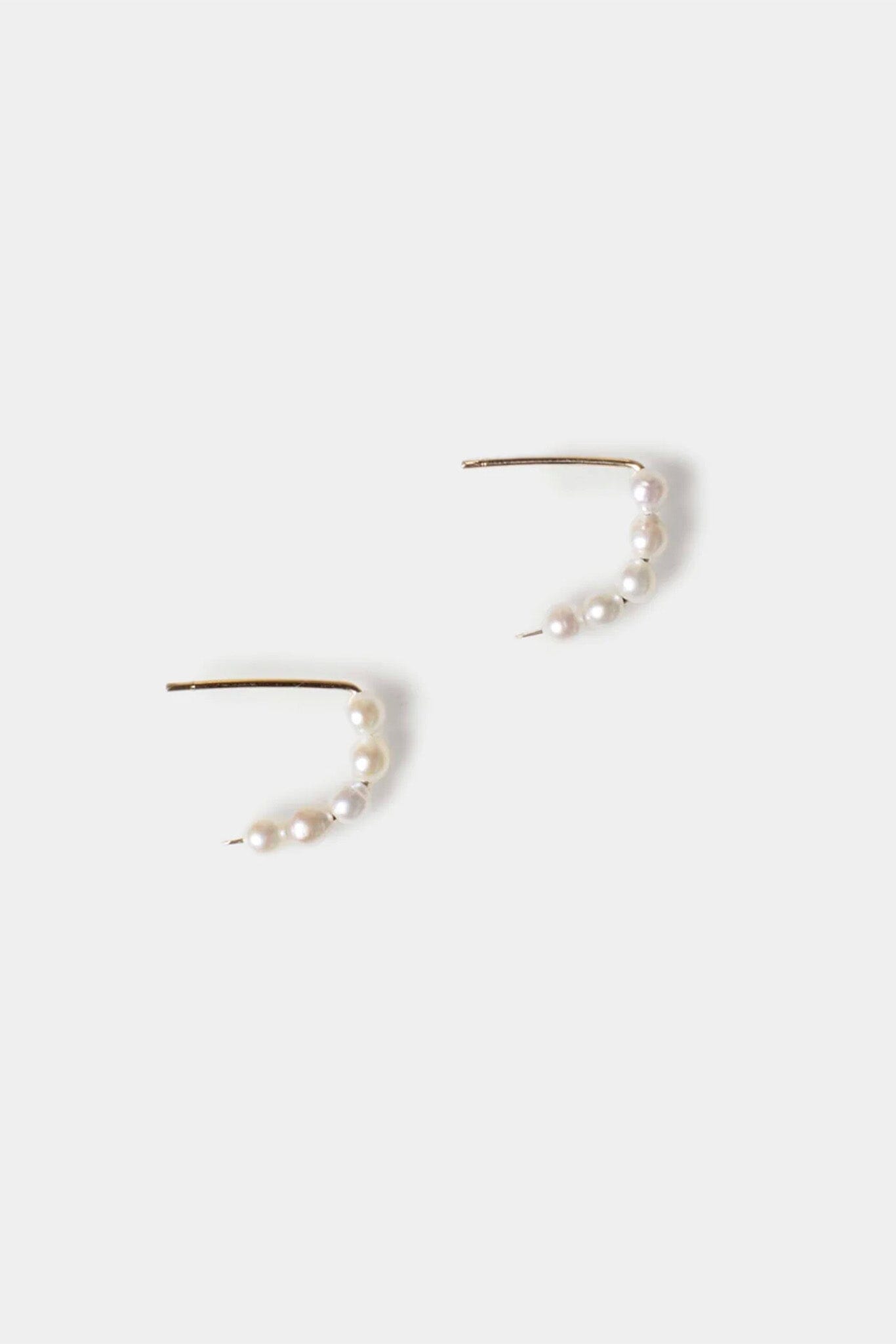 Pair of pearl earrings on a white background