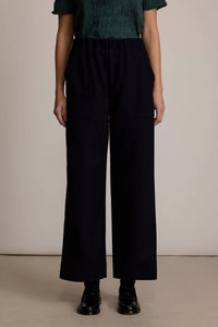 M.PATMOS Lolo Trouser, a modern navy elastic waistband wool pant with surplus pockets.