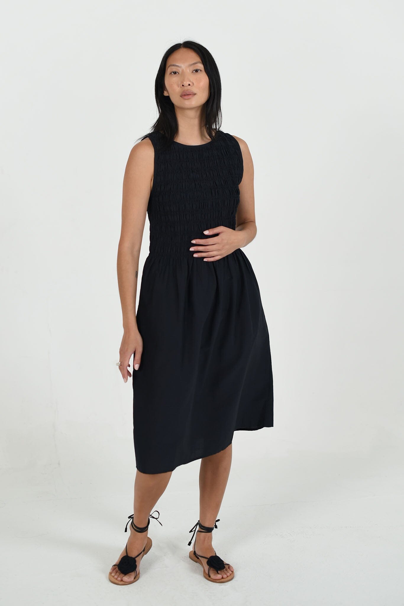 The M.Patmos black Bowie dress in size large features a relaxed, minimalist silhouette crafted with sustainable cotton-silk blend fabric