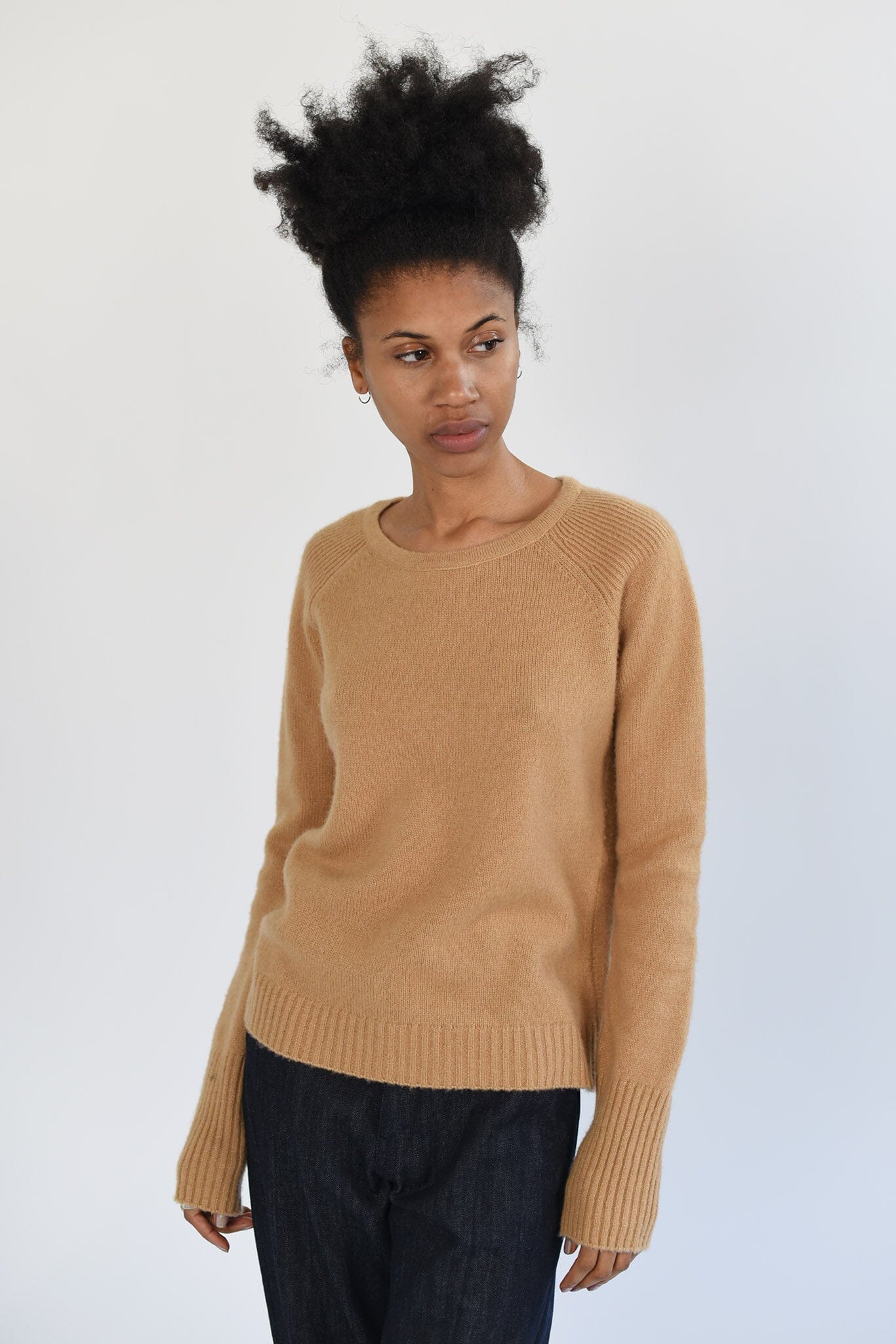 Lightweight, long sleeved cashmere sweater in camel color. Designed by M.Patmos in Brooklyn, New York.