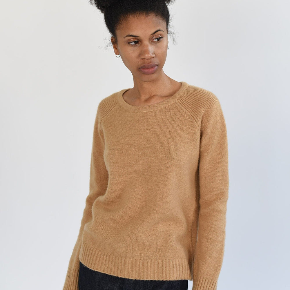 Lightweight, long sleeved cashmere sweater in camel color. Designed by M.Patmos in Brooklyn, New York.