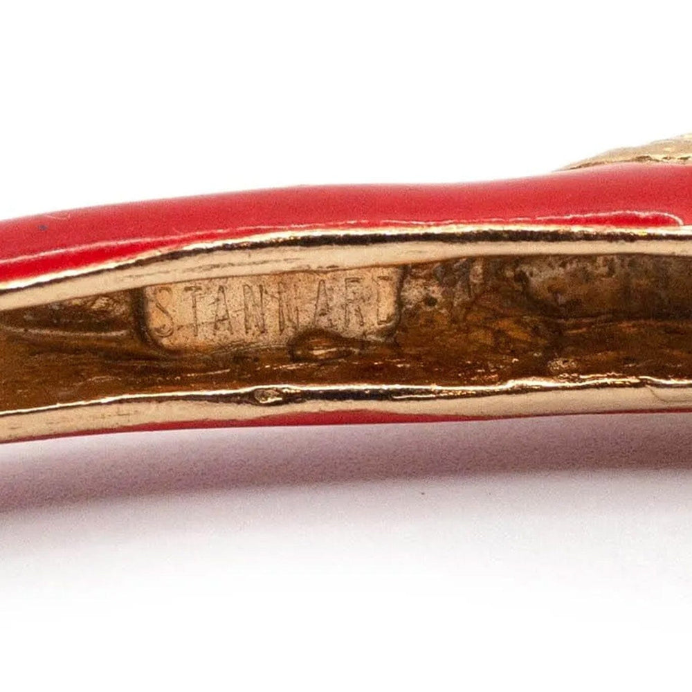 
                  
                    Close-up of a Donald Stannard vintage choker showing the interior logo. 
                  
                