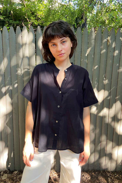 Airy summer button down shirt to keep cool in summer. Short sleeved Shirt.