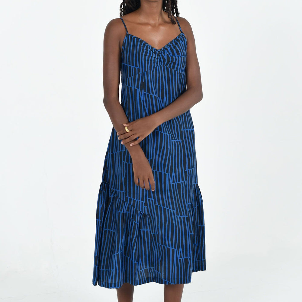 Elegant M.PATMOS Katie Dress in Woodcut Black Navy featuring an A-line silhouette, sleeveless design, and a bold abstract woodcut pattern, perfect for versatile styling. Size large.