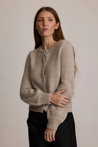 M.PATMOS Lydia Cardigan in fog, a merino cashmere crewneck with volume sleeves.