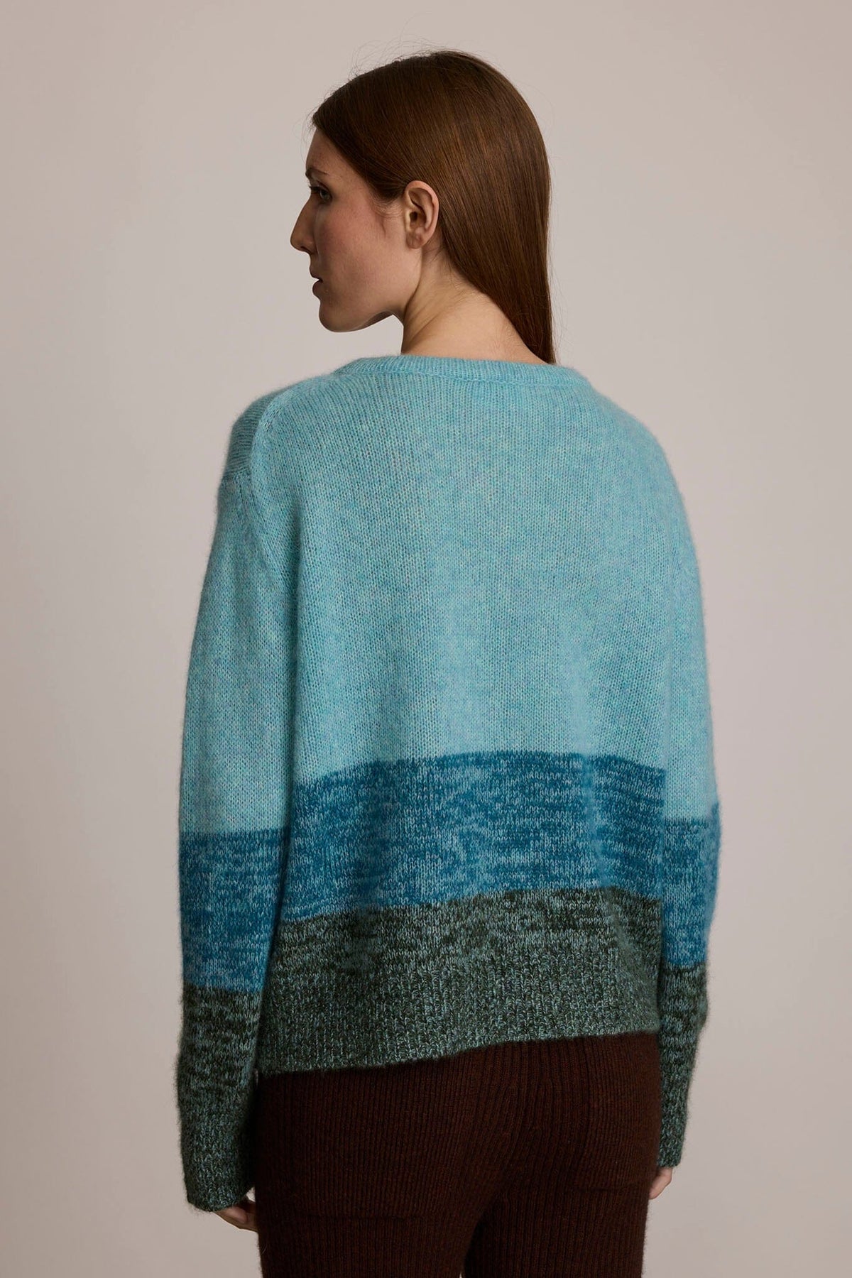 Woman wearing M.PATMOS Parker Pullover in Valley Combo, a relaxed cashmere silk gradient sweater.