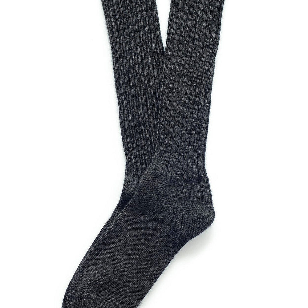 Everyday, cozy winter socks made from Alpaca fibers. The color is a rich charcoal gray.