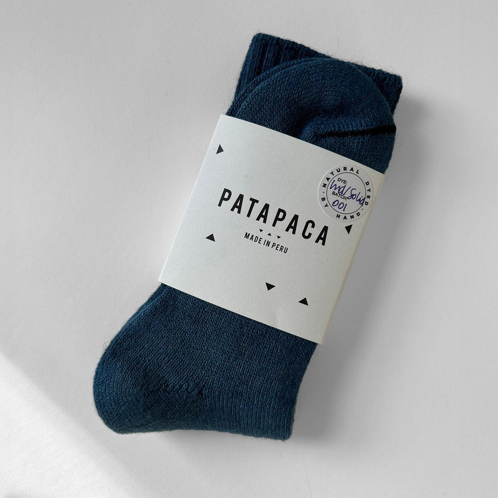 
                  
                    Indigo alpaca socks in Pata Paca packaging
                  
                