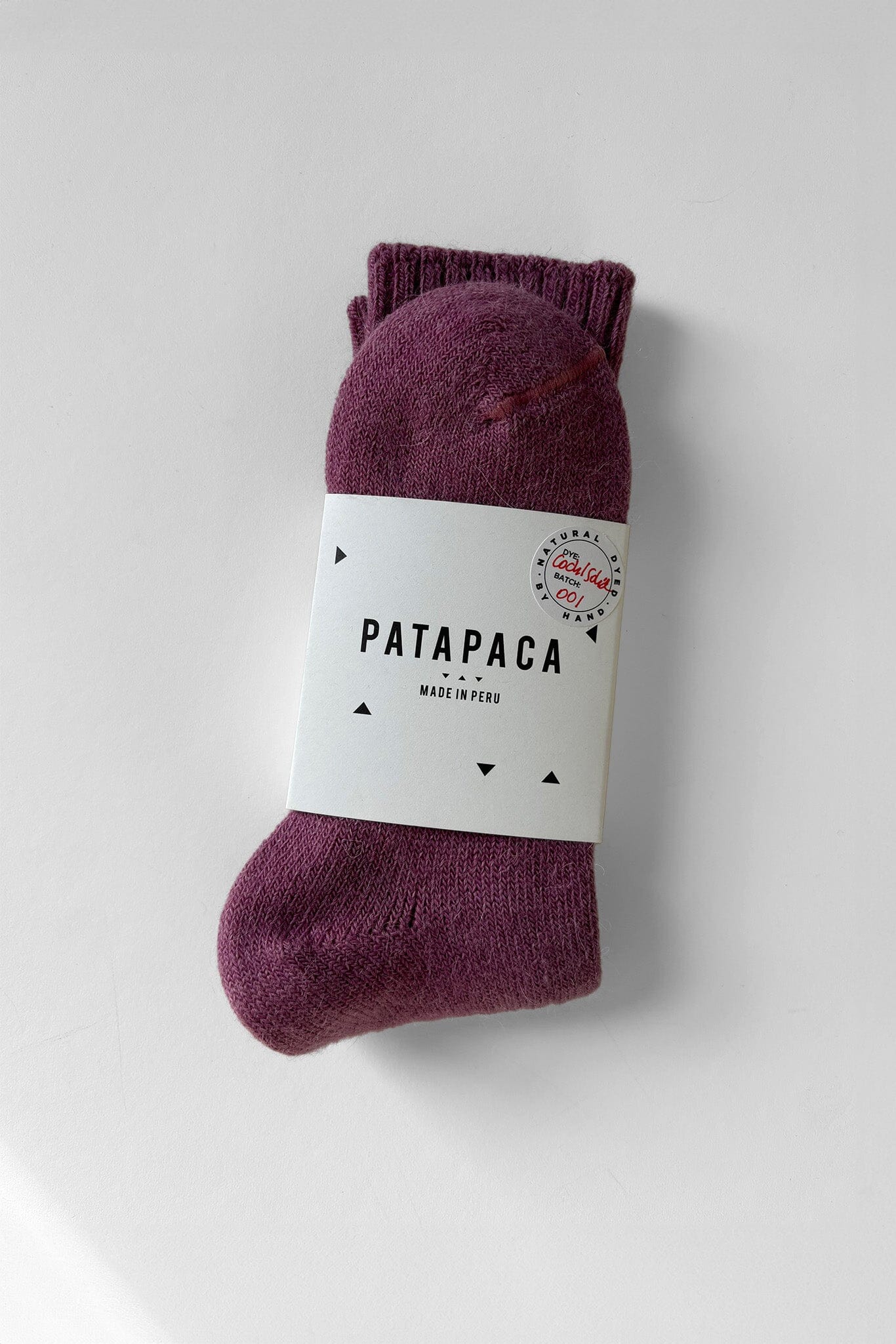 Cochineal winter socks in packaging from Pata Paca