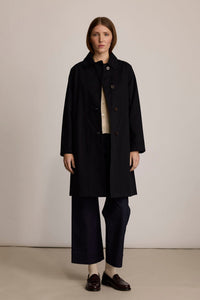 M.PATMOS black organic cotton women's Sylvie mackintosh with horn buttons and twill fabric.