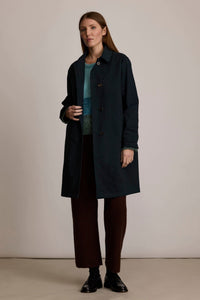 M.PATMOS navy organic cotton women's Sylvie mackintosh with horn buttons and twill fabric.