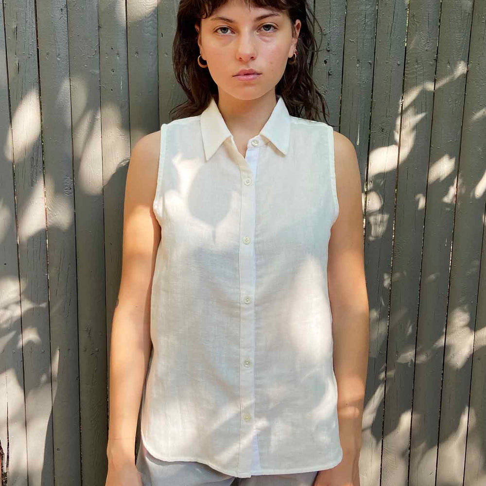 Cute tank top for the summer. Sleeveless collared button down cotton shirt.