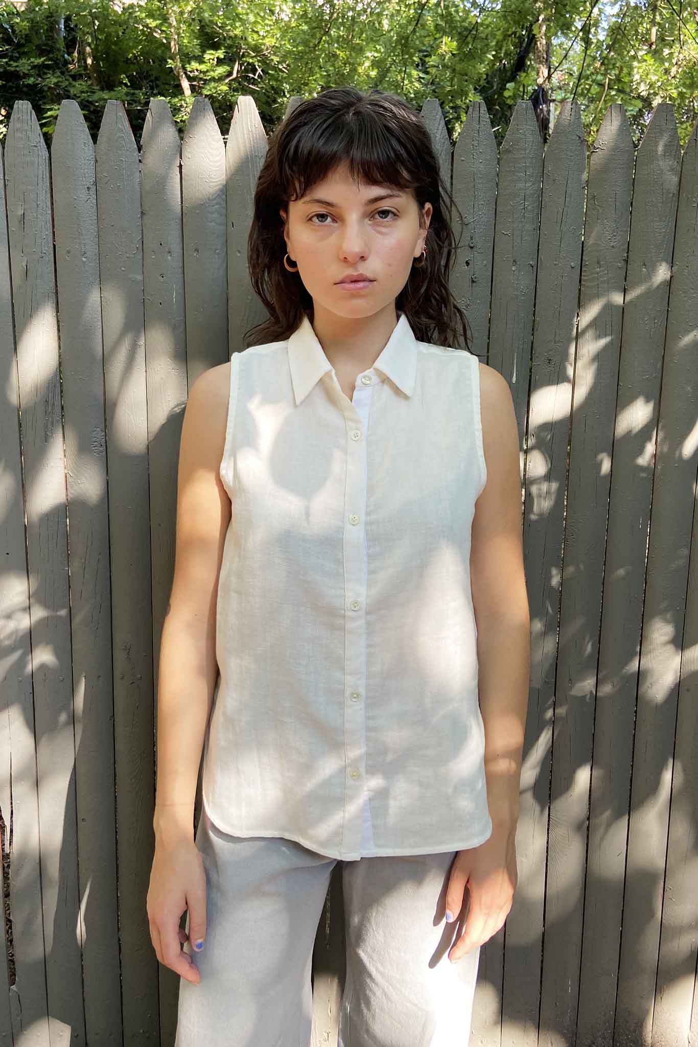 Cute tank top for the summer. Sleeveless collared button down cotton shirt.