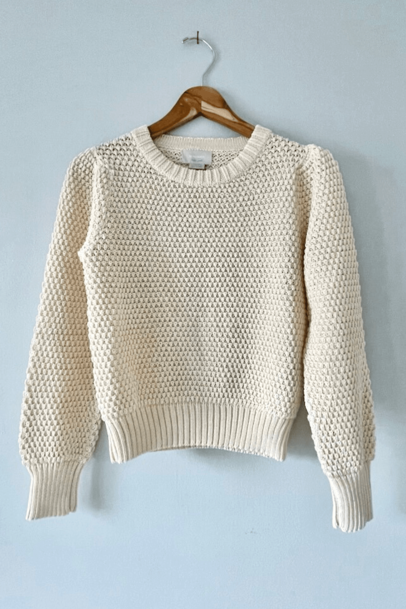 Textural cotton knit crewneck sweater. Made in peru.