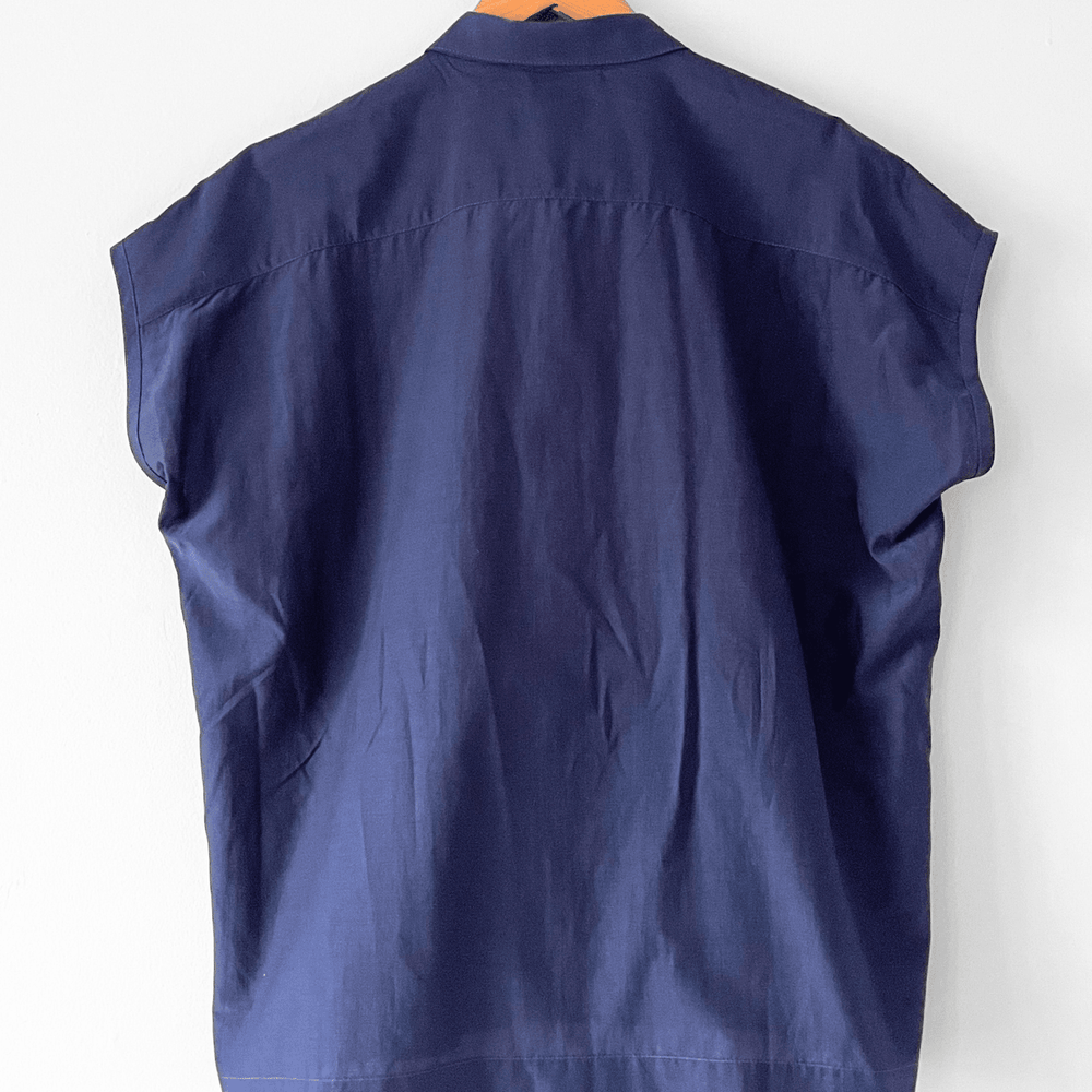 
                  
                    Best summer top. Sleeveless button down cotton silk shirt.
                  
                