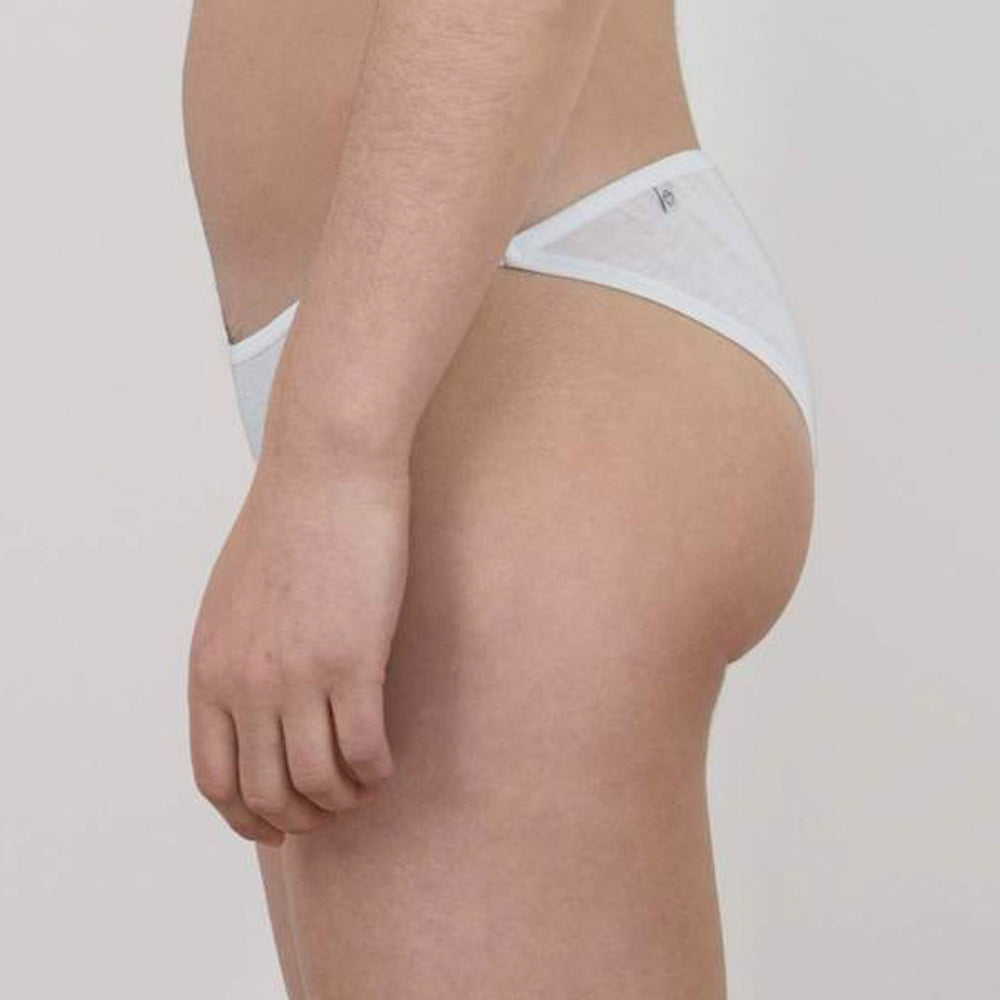 
                  
                    The side view of the white Oddobody bikini underwear
                  
                