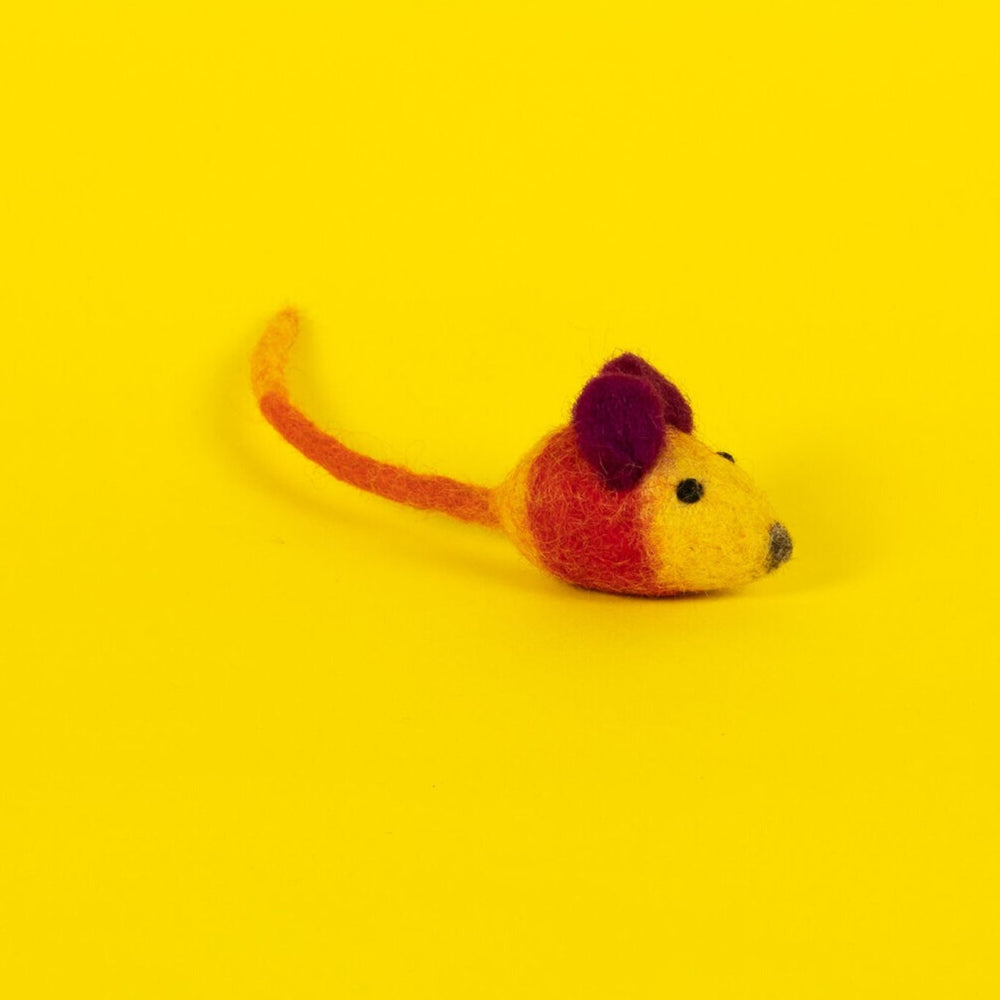 A felted wool cat toy designed to look like a mouse, with red and orange accents on a yellow background.