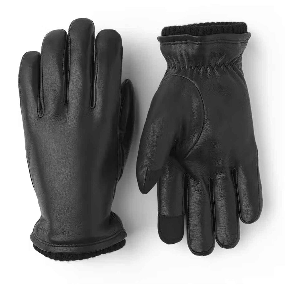 A pair of black, men's leather gloves with a ribbed cuff and touchscreen-compatible fingertips.