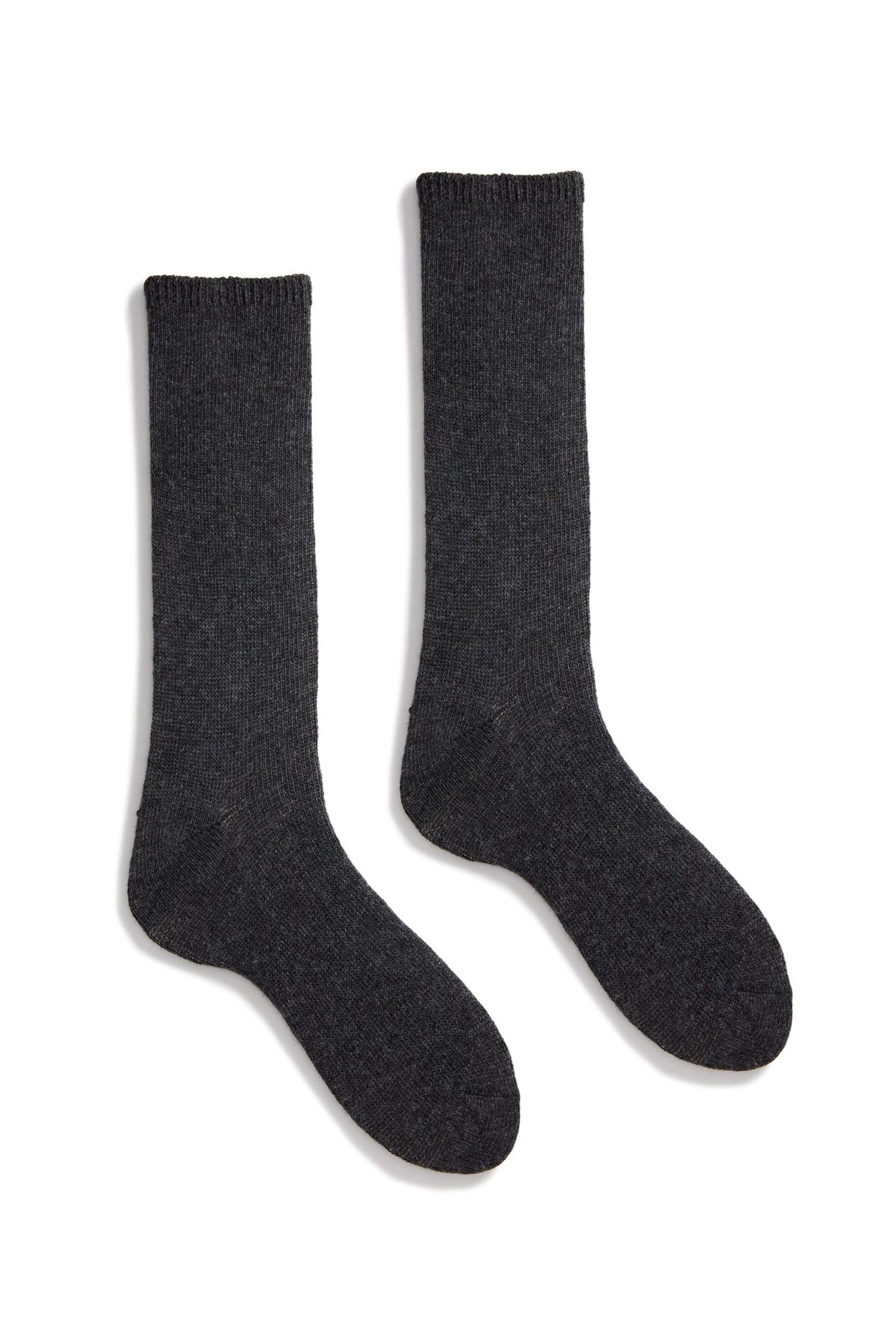 A pair of charcoal-colored cashmere ad wool socks laid out flat.