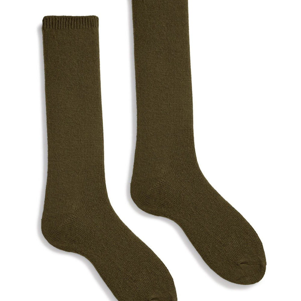 A pair of olive green cashmere and wool socks laid out flat.