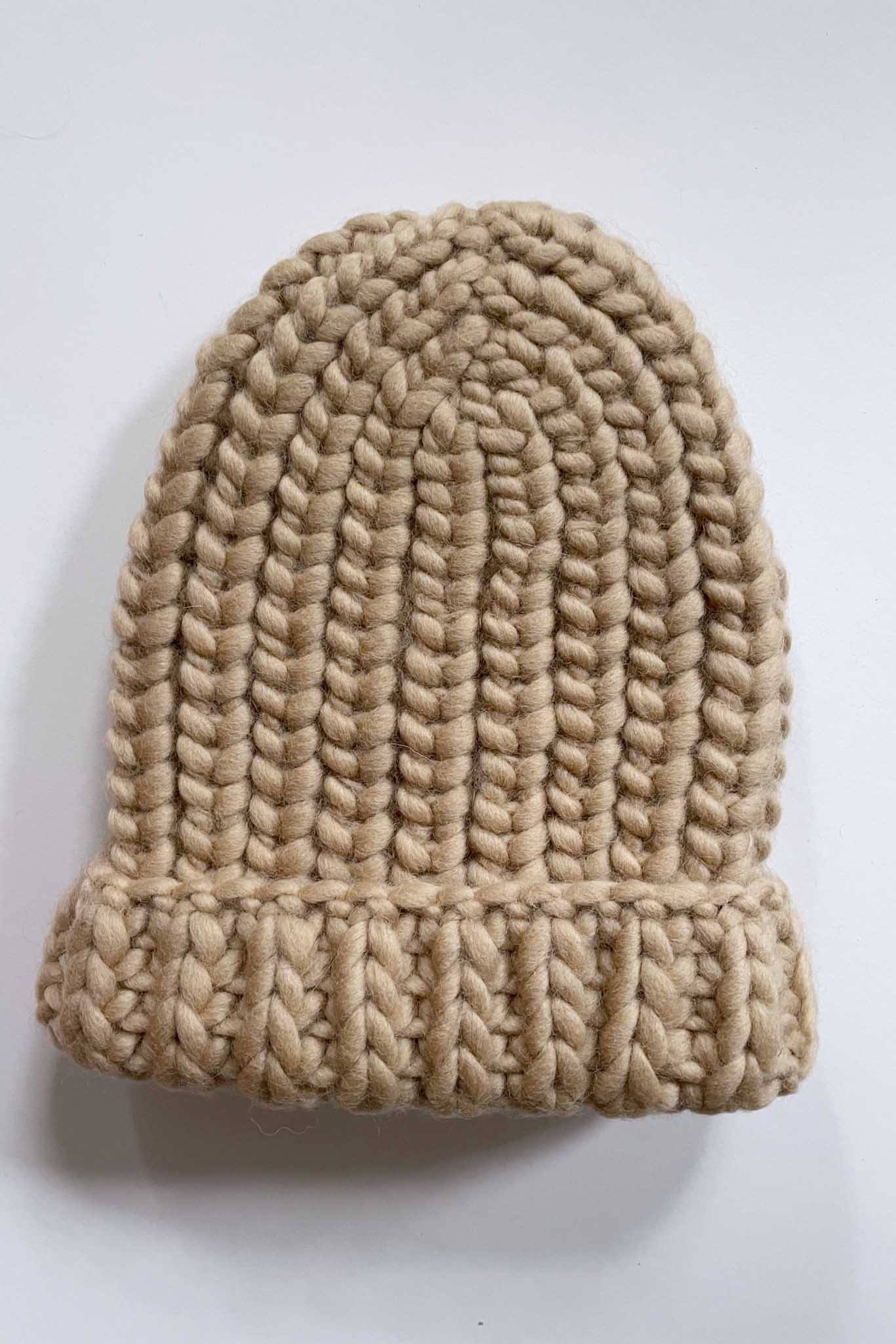 Hand knit wool hat perfect for fall and winter. Made in Perul